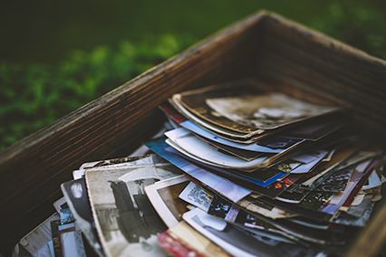 a box of old photographs that someone should have framed a long time ago